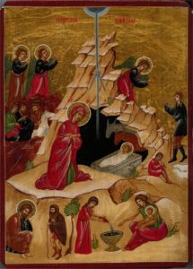 A depiction of the birth of Jesus Christ in an iconographic style.